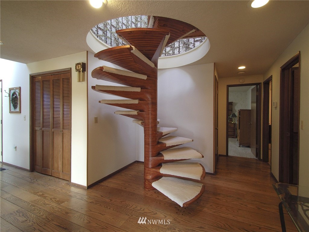 103 Rondale Drive Sequim, WA 98382 - Photo 14 of 35 a view of entryway and hall with wooden floor