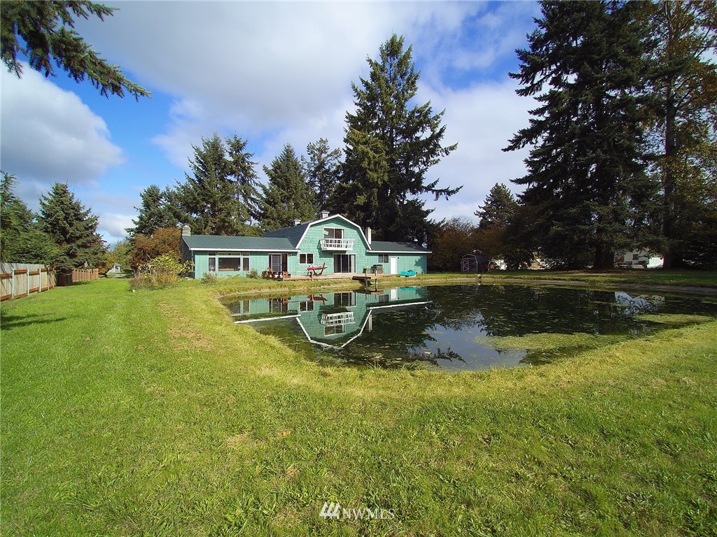 103 Rondale Drive Sequim, WA 98382 - Photo 35 of 35 a swimming pool with outdoor seating and yard