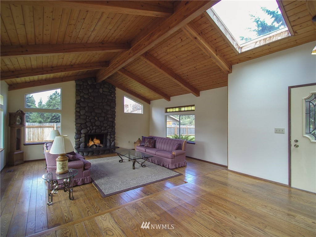 103 Rondale Drive Sequim, WA 98382 - Photo 6 of 35 a living room with furniture large window and wooden floor