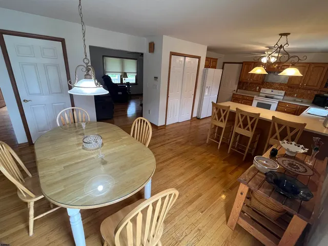 a living room with furniture and gym equipment