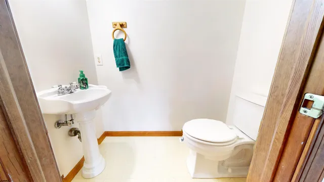 a view of a big yard with a tree