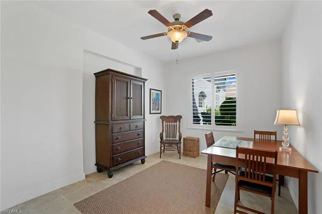 a workspace with furniture and window