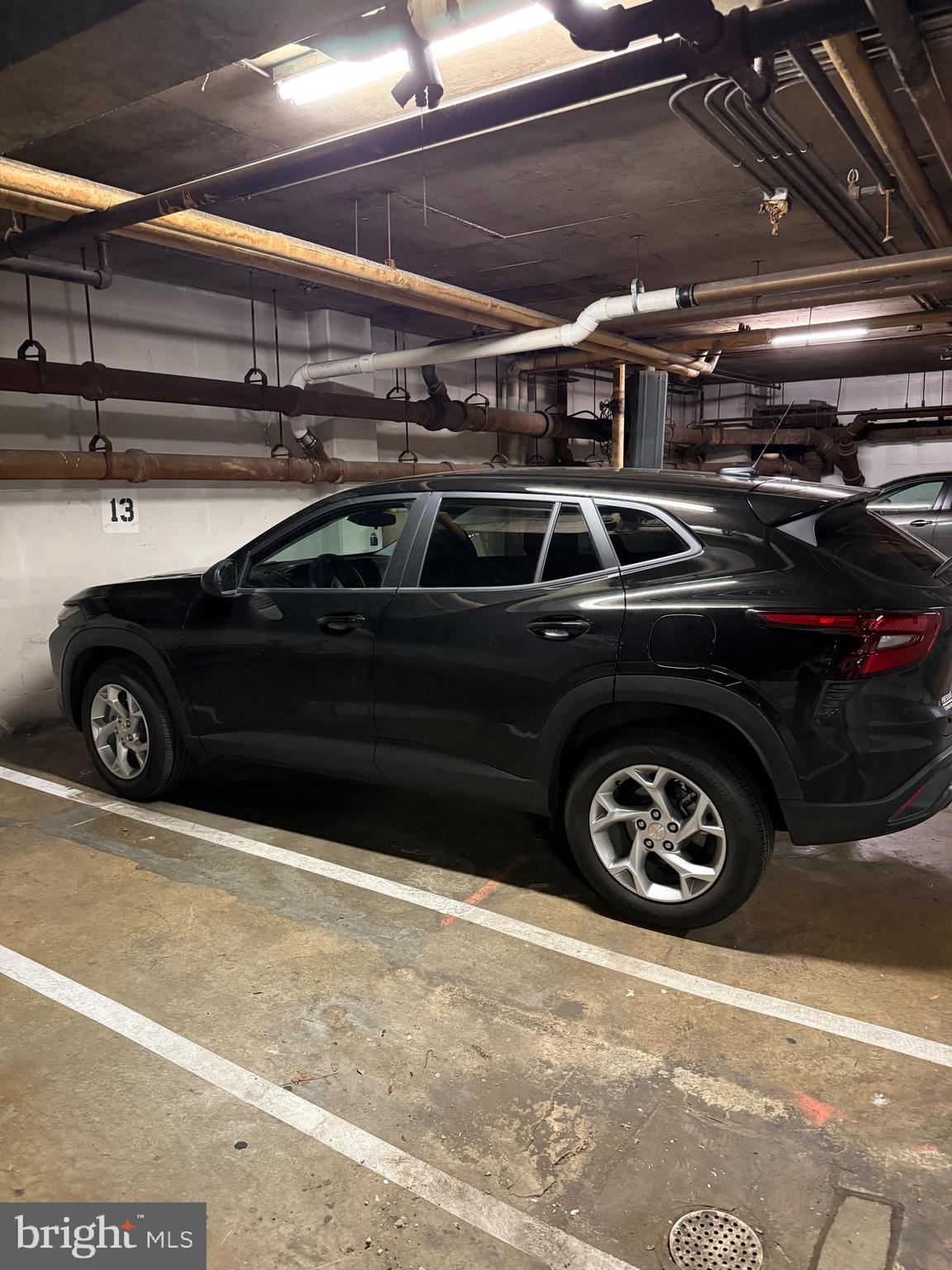 522 21st Street Northwest Washington, DC 20006 - Photo 6 of 7 a car that is parked in a garage