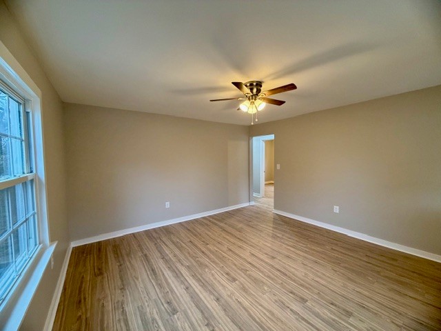 417 Laura Avenue Winchester, TN 37398 - Photo 5 of 18 a view of an empty room with wooden floor