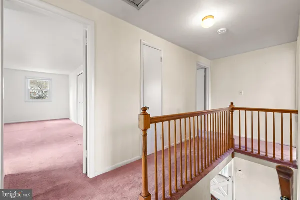 a view of a hallway with entryway