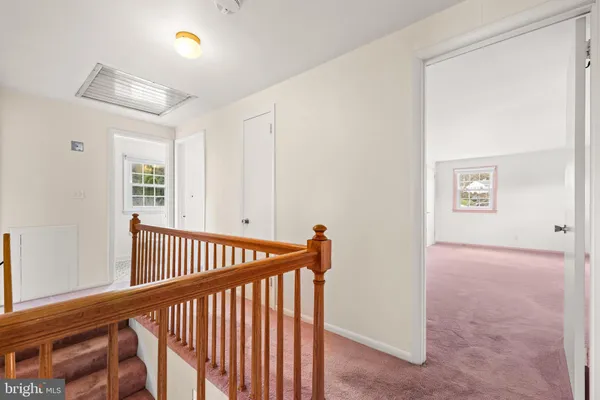a view of a hallway and window