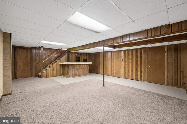 a view of a kitchen with storage and utility