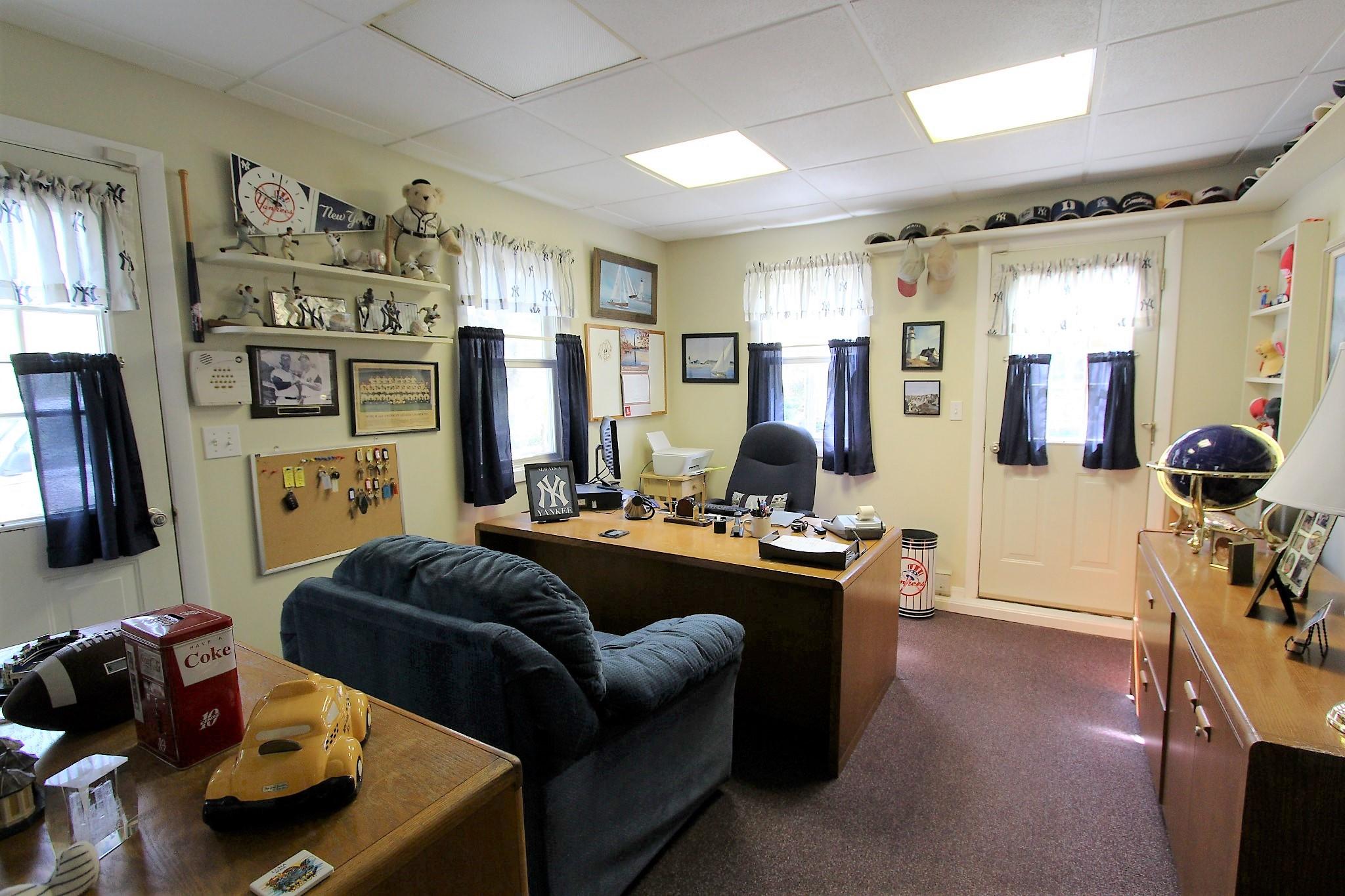 35 Tuckernuck Road Centerville, MA 02632 - Photo 12 of 28 a living room with furniture and a flat screen tv