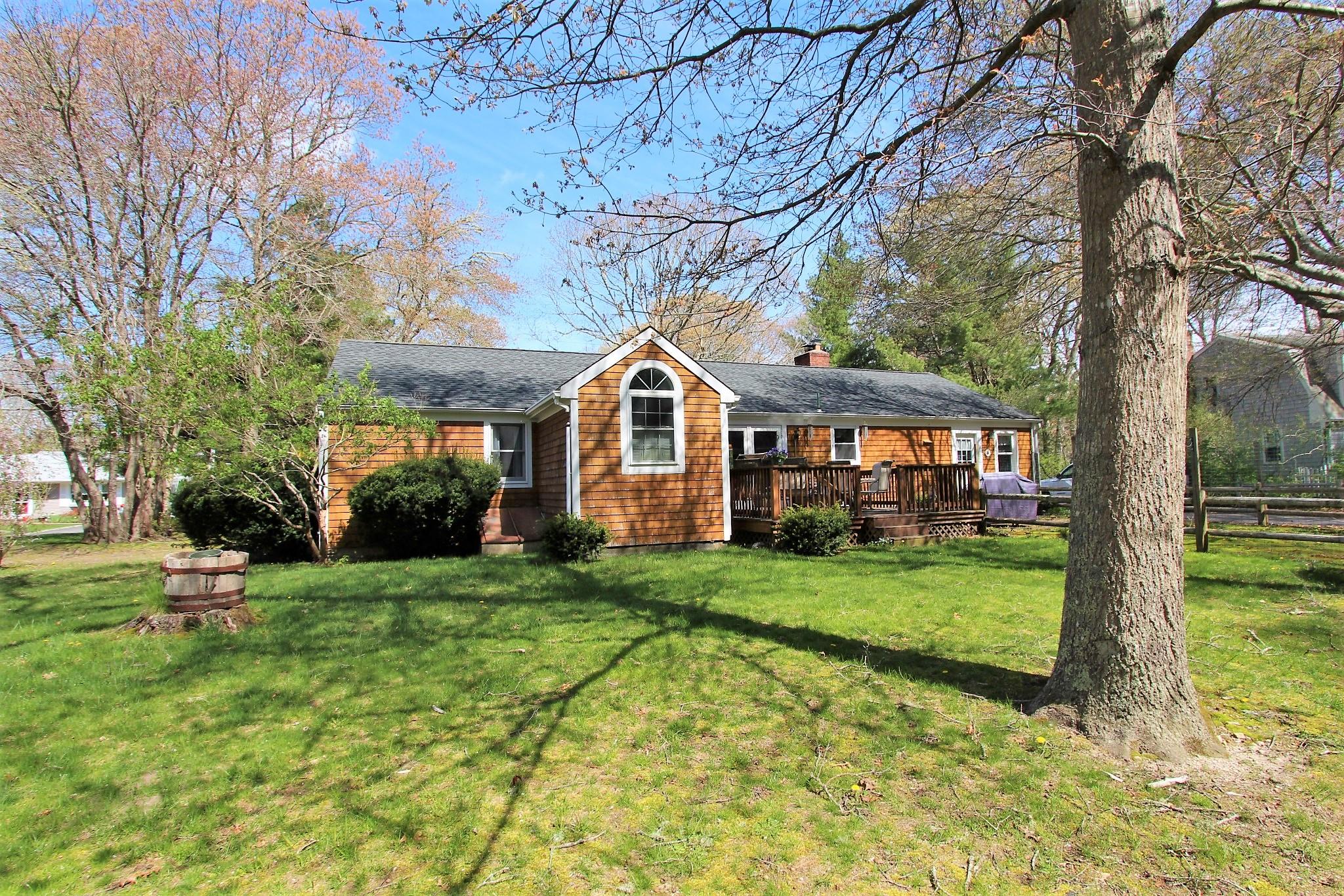 35 Tuckernuck Road Centerville, MA 02632 - Photo 17 of 28 a front view of a house with a yard