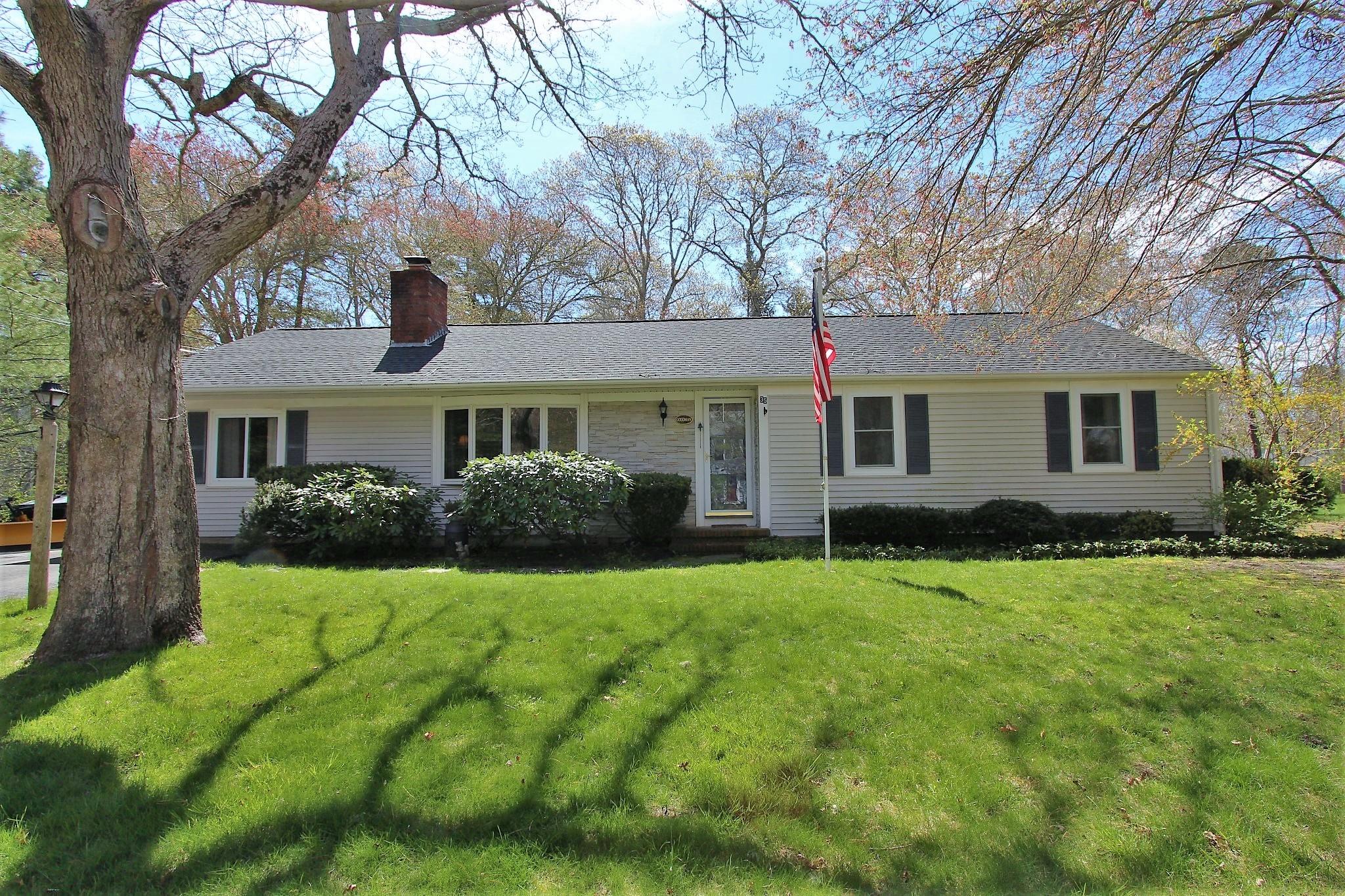 35 Tuckernuck Road Centerville, MA 02632 - Photo 2 of 28 front view of a house and a yard