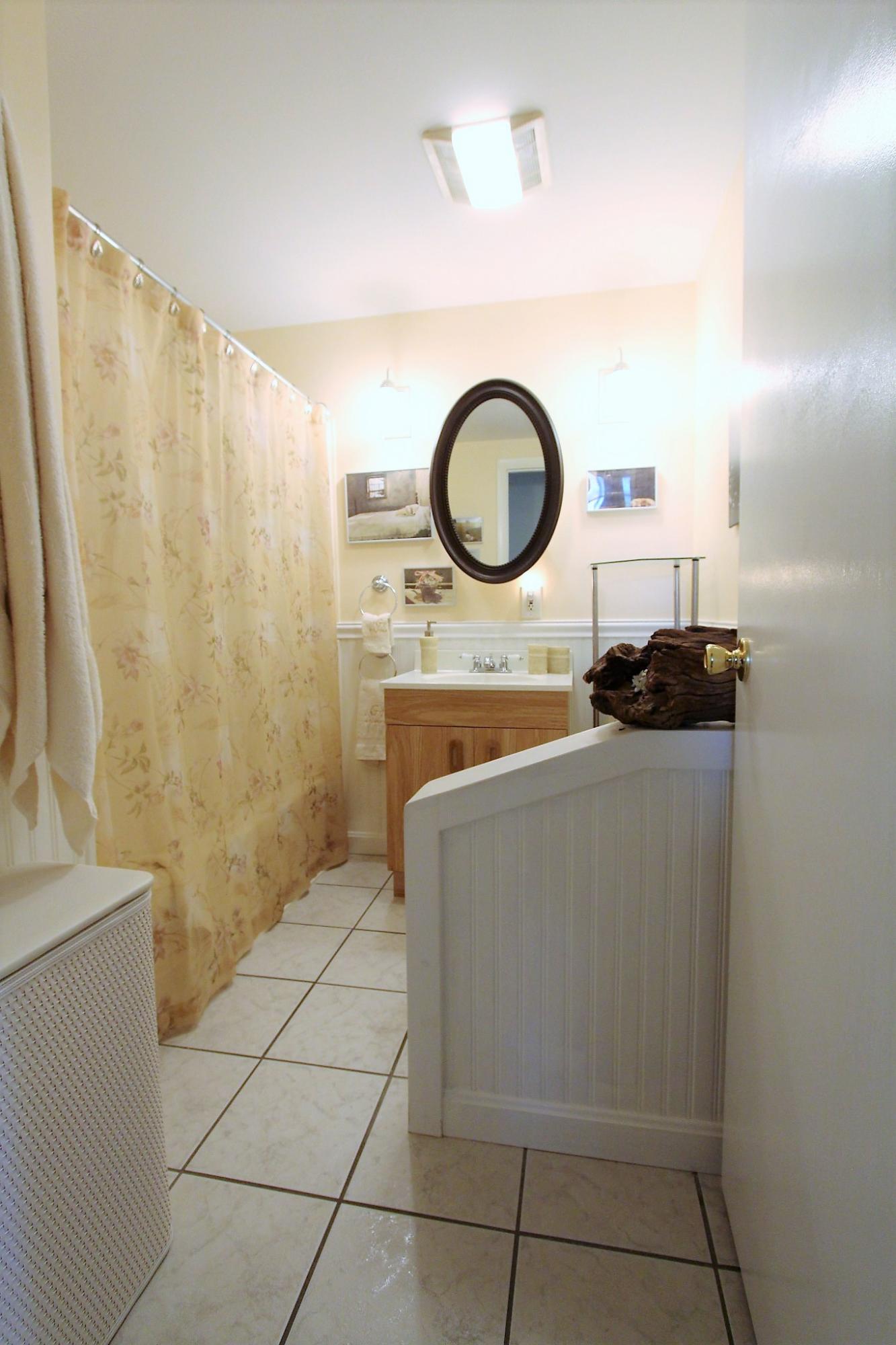 35 Tuckernuck Road Centerville, MA 02632 - Photo 24 of 28 a bathroom with a sink a toilet and a shower