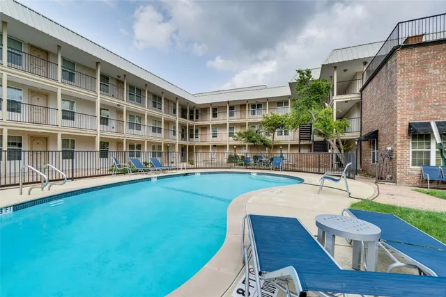a view of a chairs with a patio