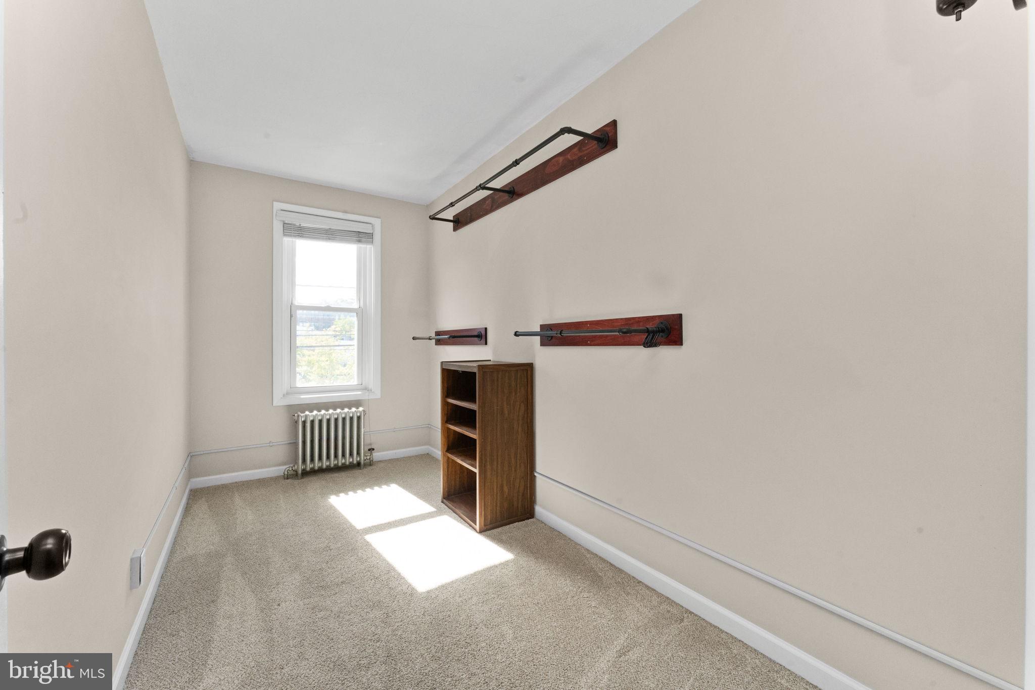 345 Hall Street Phoenixville, PA 19460 - Photo 17 of 32 an empty room with windows