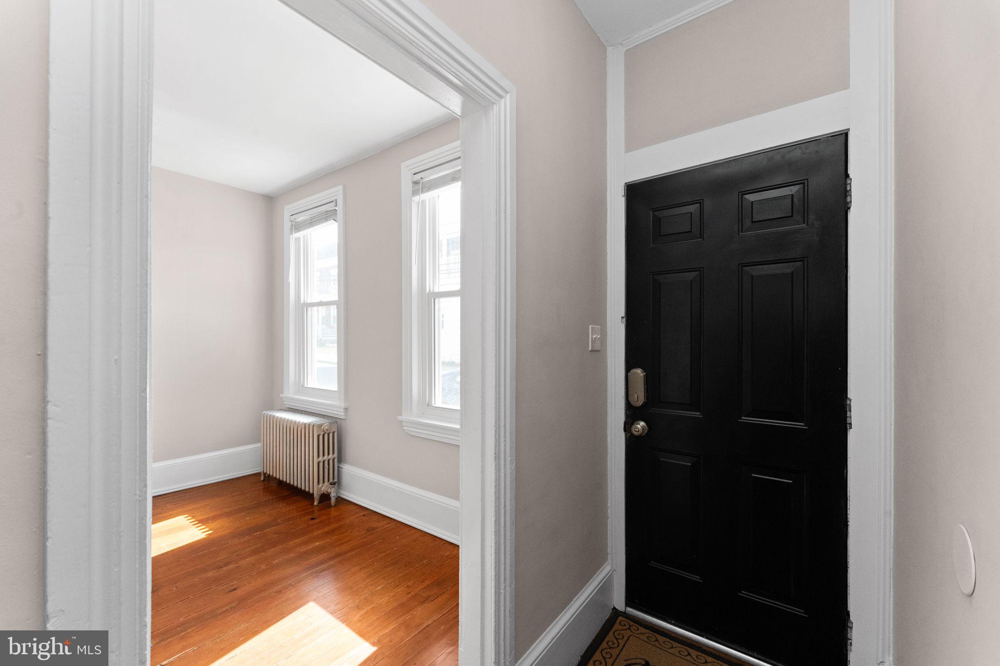 345 Hall Street Phoenixville, PA 19460 - Photo 4 of 32 a view of an empty room and window