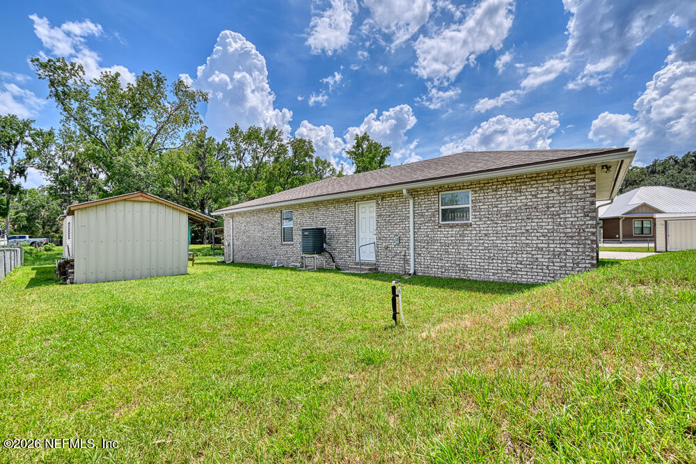 7837 Rusty Anchor Road St. Augustine, FL 32092 - Photo 28 of 41 Side Yard Area - View 1