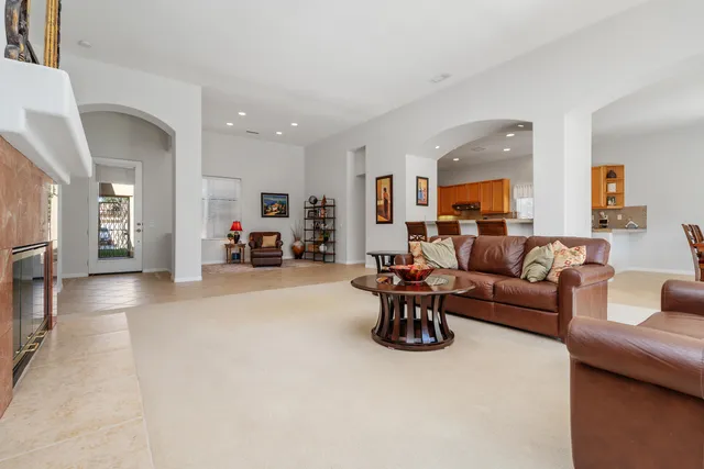 a living room with furniture and a couch