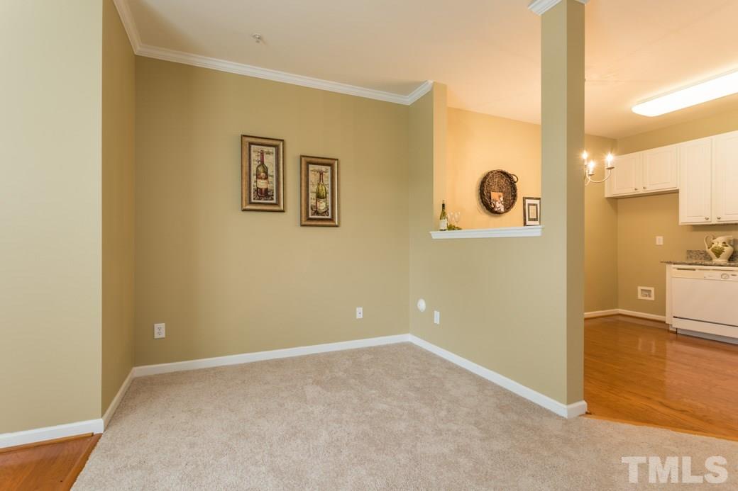 2211-102 Raven Road, Unit 102 Raleigh, NC 27614 - Photo 3 of 6 Great space for your dinning table in the LARGE dinning and family room.
