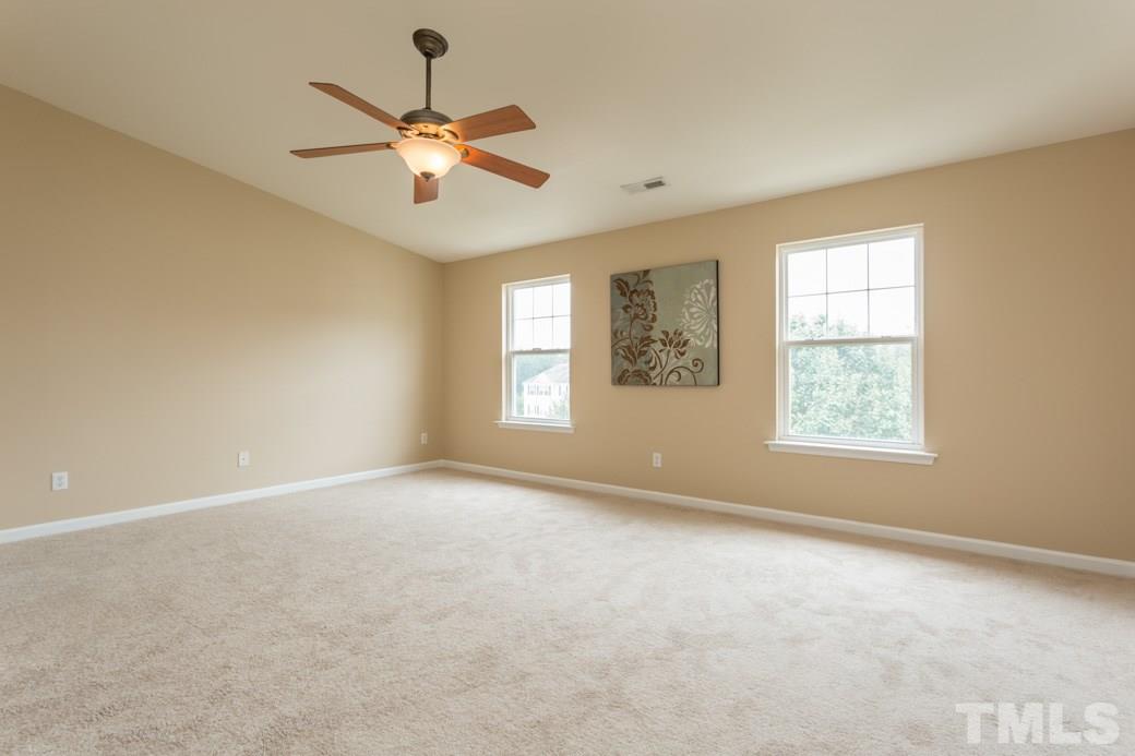 2211-102 Raven Road, Unit 102 Raleigh, NC 27614 - Photo 4 of 6 LARGE and PRIVATE master suite on a floor all to itself with a WALK IN CLOSET and SPA tub in master bath.
