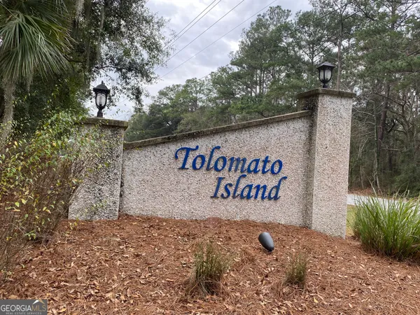 a view of outdoor space with sign board