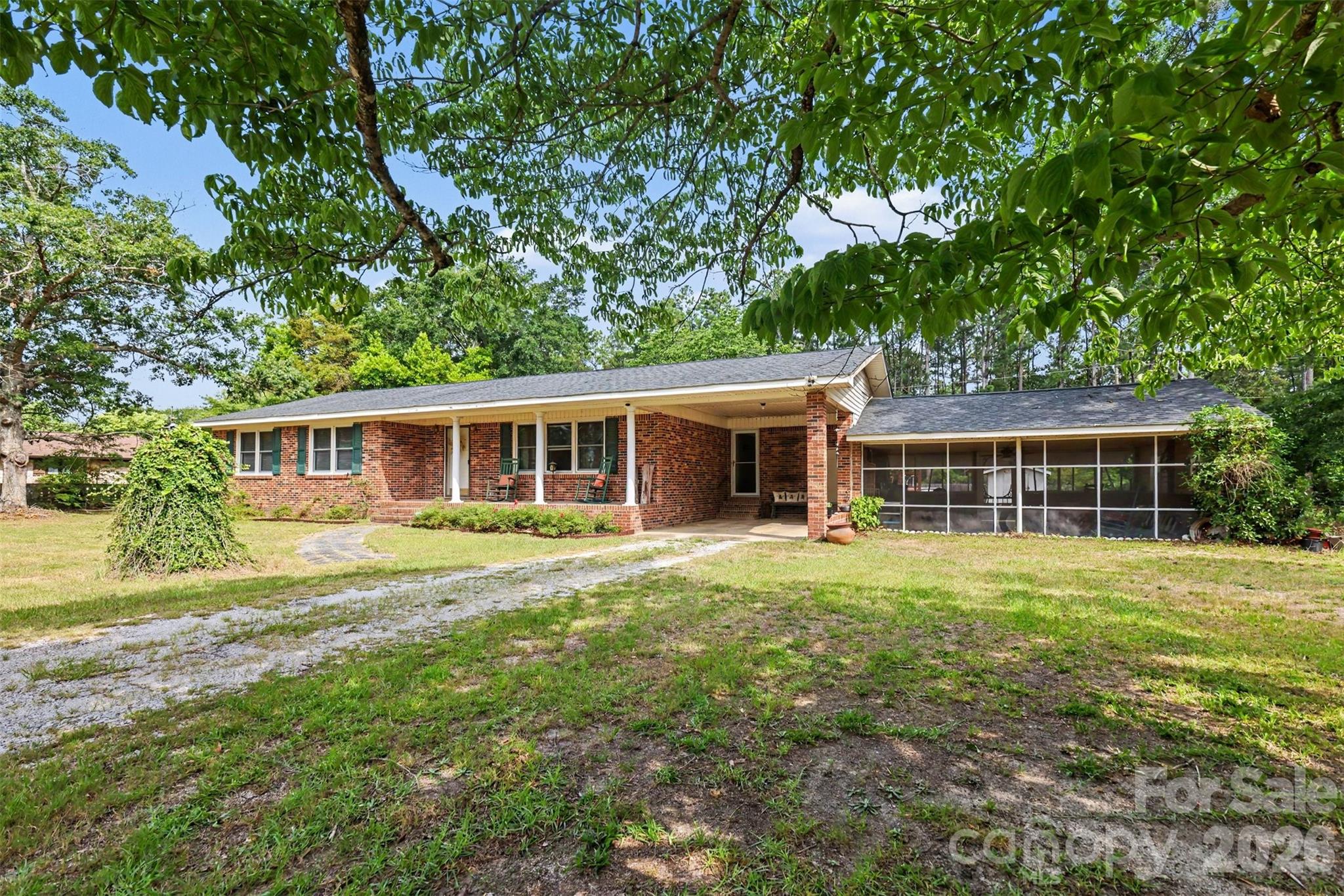6774 Woodhaven Road Kershaw, SC 29067 - Photo 3 of 30 front view of a house with a garden