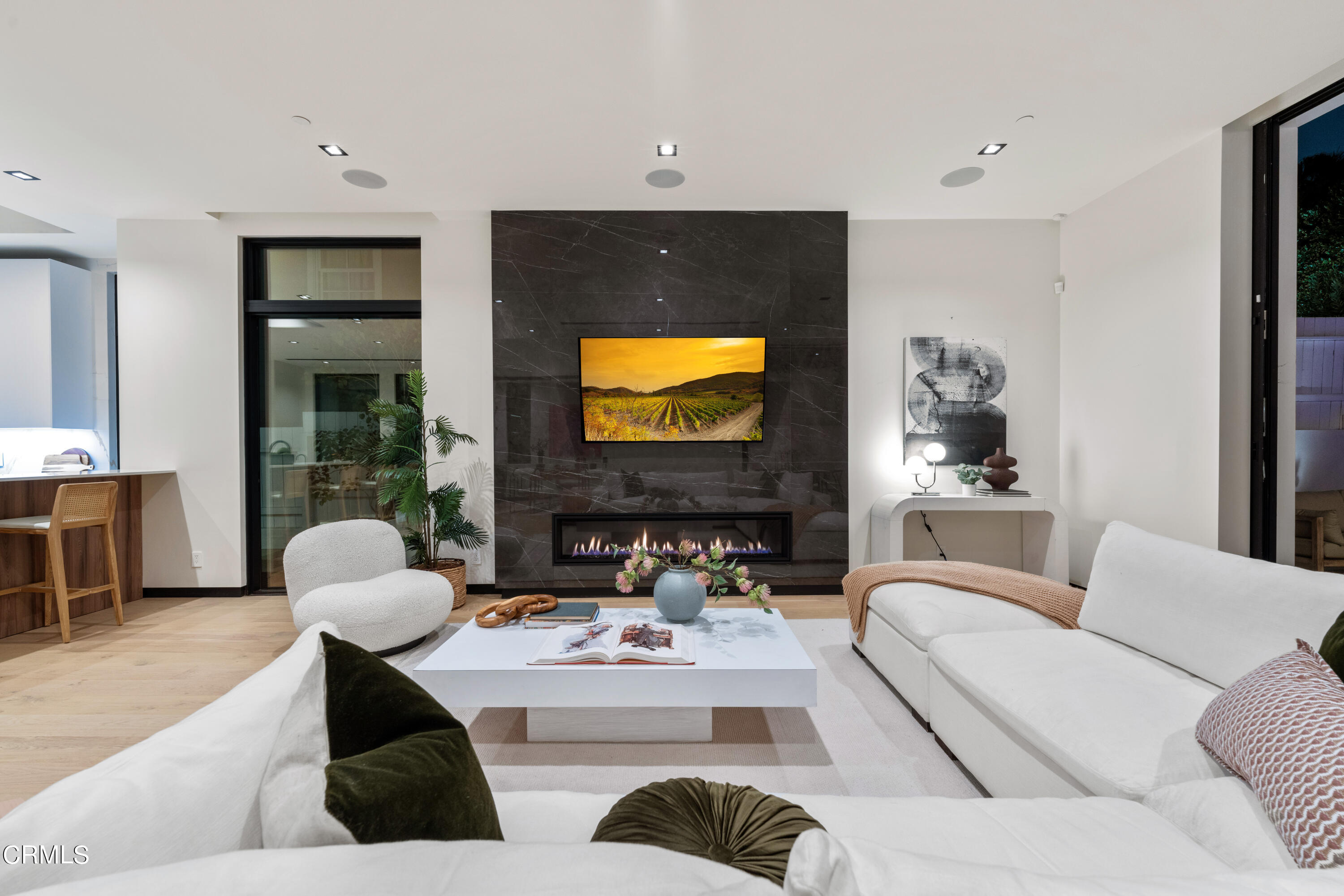 868 9th Street Manhattan Beach, CA 90266 - Photo 16 of 46 a living room with furniture and a flat screen tv