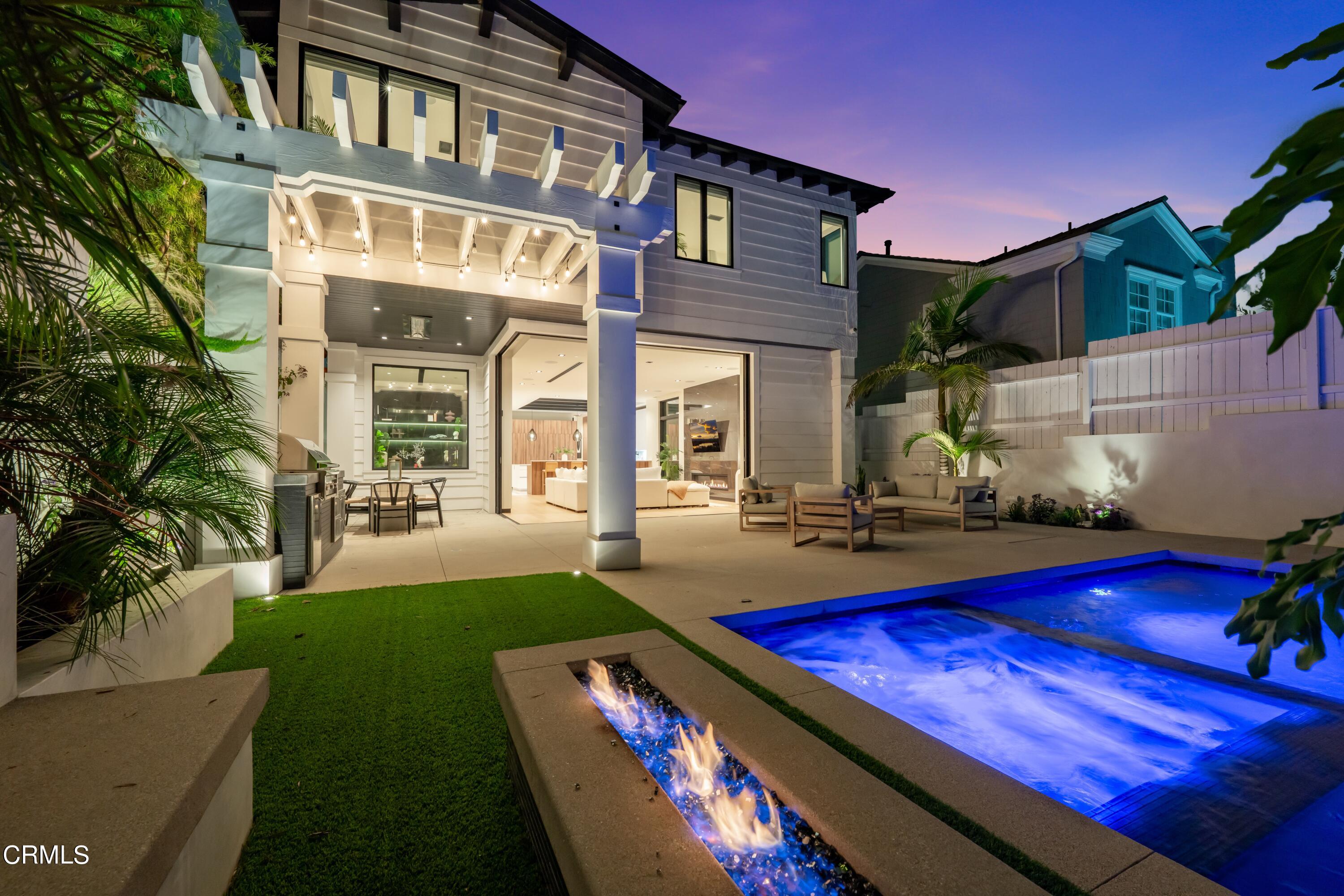 868 9th Street Manhattan Beach, CA 90266 - Photo 19 of 46 a view of an house with backyard