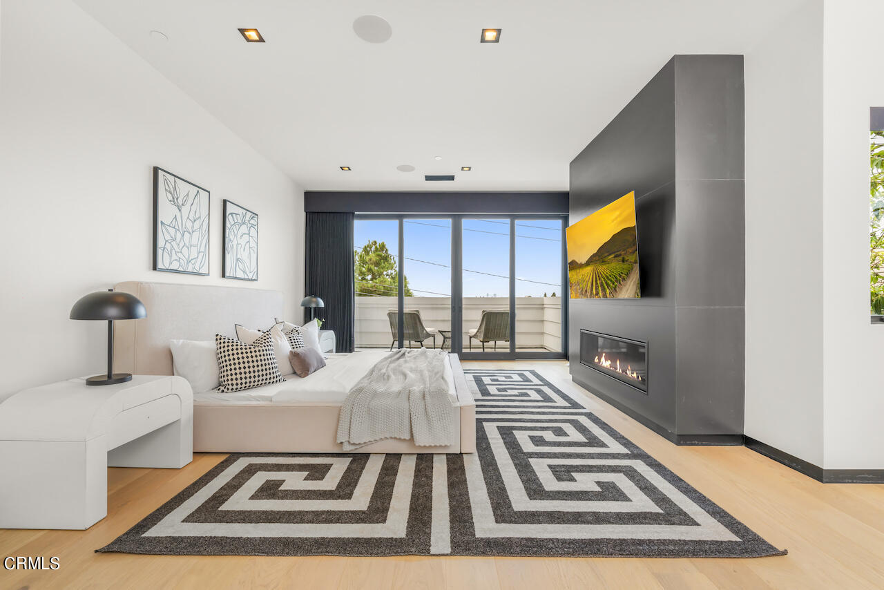 868 9th Street Manhattan Beach, CA 90266 - Photo 22 of 46 a living room with a couch and a flat screen tv