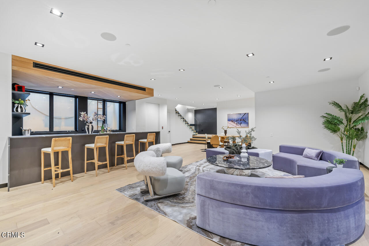 868 9th Street Manhattan Beach, CA 90266 - Photo 37 of 46 a living room with furniture and a flat screen tv