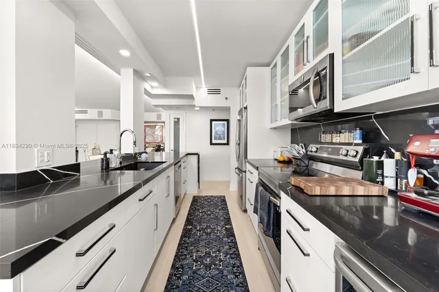 a bathroom with a double vanity sink a and a mirror