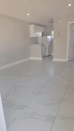 a view of a kitchen with a sink