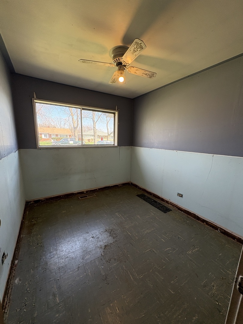 17226 Community Street Lansing, IL 60438 - Photo 12 of 24 an empty room with a window