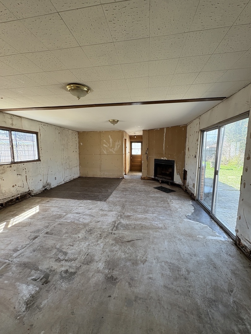 17226 Community Street Lansing, IL 60438 - Photo 16 of 24 a view of empty room with a fireplace