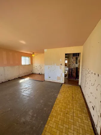 a view of hallway with a couch