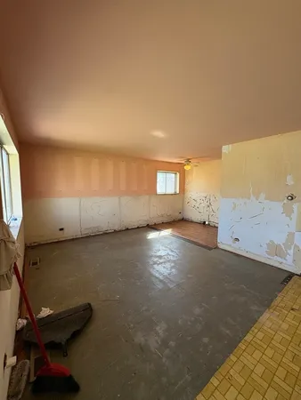 an empty room with windows