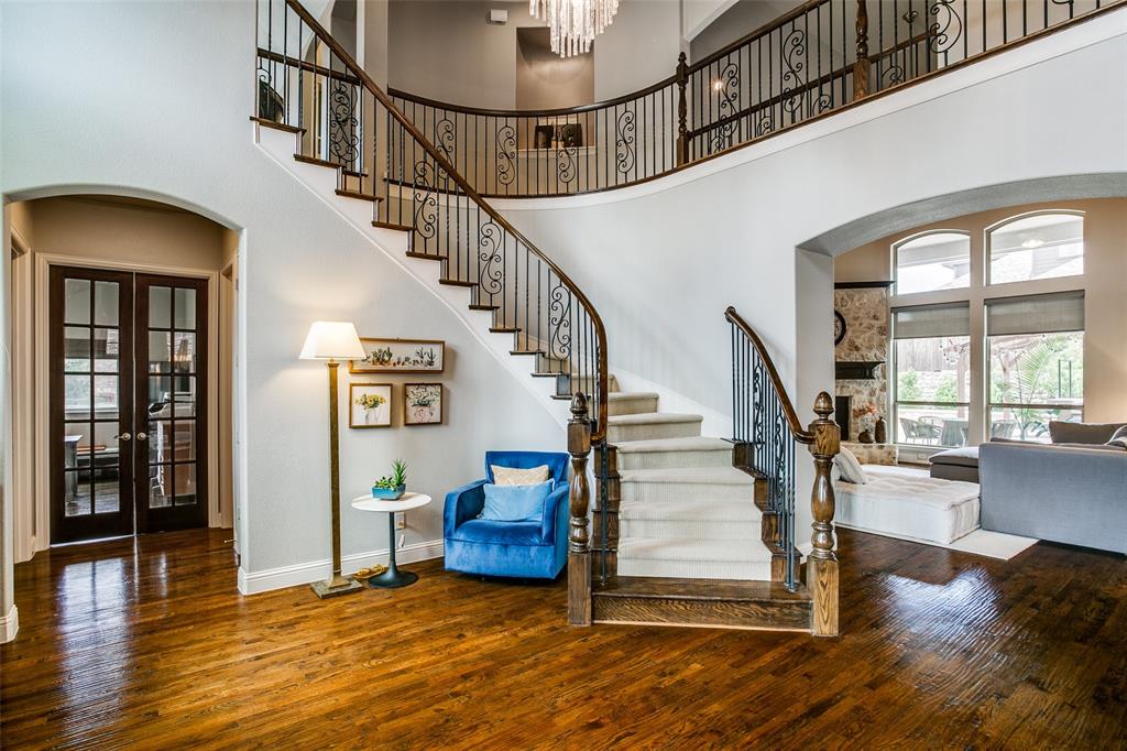 1518 Saddle Tree Road Frisco, TX 75036 - Photo 7 of 40 a view of entryway livingroom and hall with wooden floor