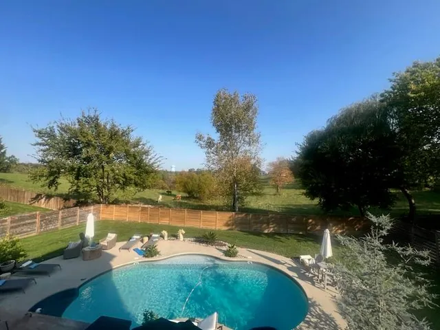 $625,000 | 1409 Southeast Woodbine Drive, Blue Springs, MO 64014