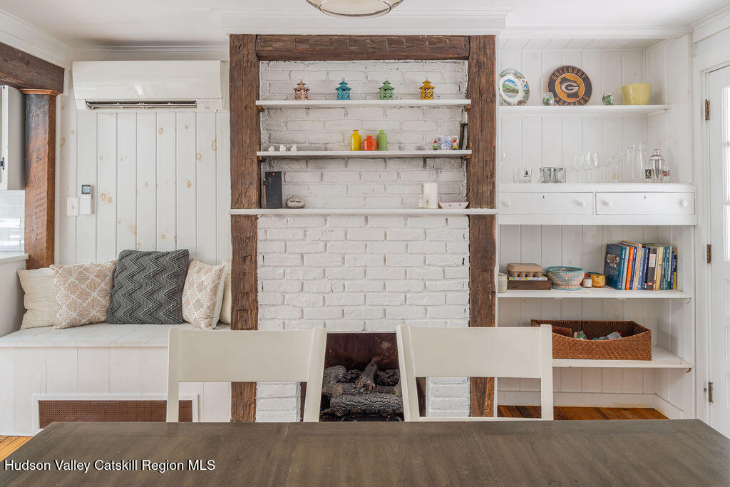 347 Hickory Bush Road Kingston, NY 12401 - Photo 13 of 44 a living room with furniture and a fireplace