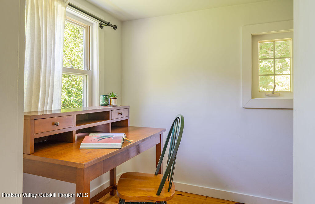 347 Hickory Bush Road Kingston, NY 12401 - Photo 19 of 44 a room with a table and a window
