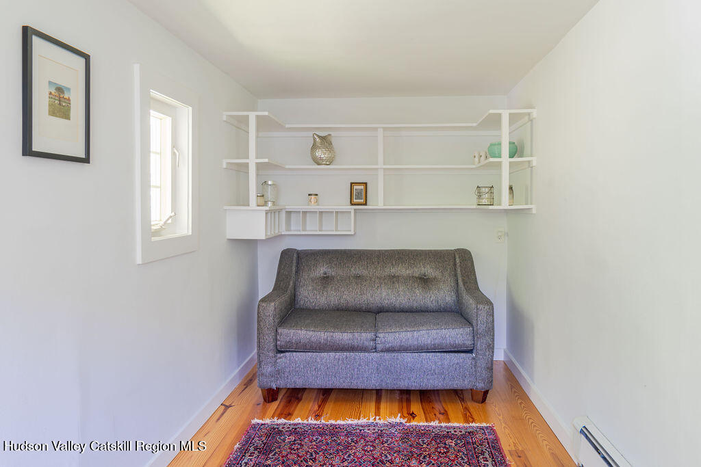 347 Hickory Bush Road Kingston, NY 12401 - Photo 21 of 44 a room with a couch and window