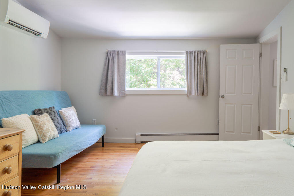 347 Hickory Bush Road Kingston, NY 12401 - Photo 28 of 44 a living room with furniture and a window
