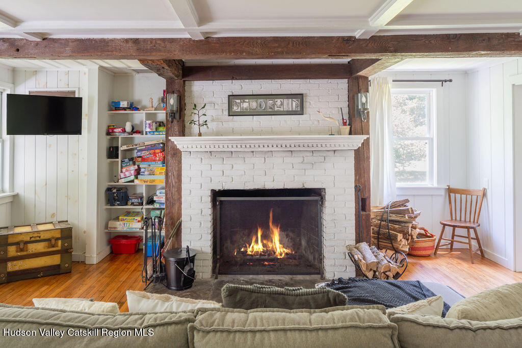 347 Hickory Bush Road Kingston, NY 12401 - Photo 4 of 44 a living room with furniture and a fireplace