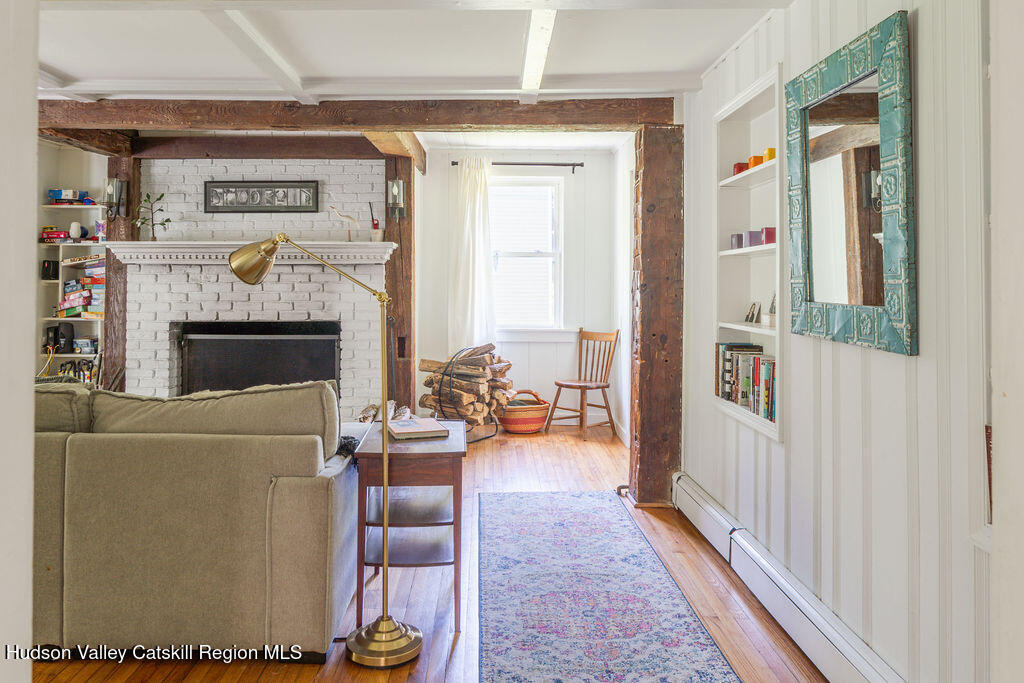 347 Hickory Bush Road Kingston, NY 12401 - Photo 5 of 44 a living room with furniture and a fireplace