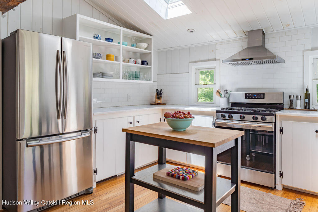 347 Hickory Bush Road Kingston, NY 12401 - Photo 7 of 44 a kitchen with stainless steel appliances a stove a refrigerator and a cabinets