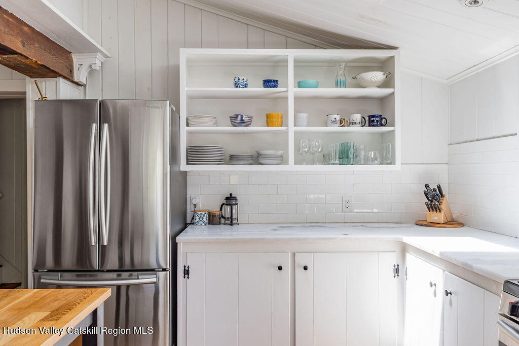 347 Hickory Bush Road Kingston, NY 12401 - Photo 8 of 44 a kitchen with a refrigerator and a sink