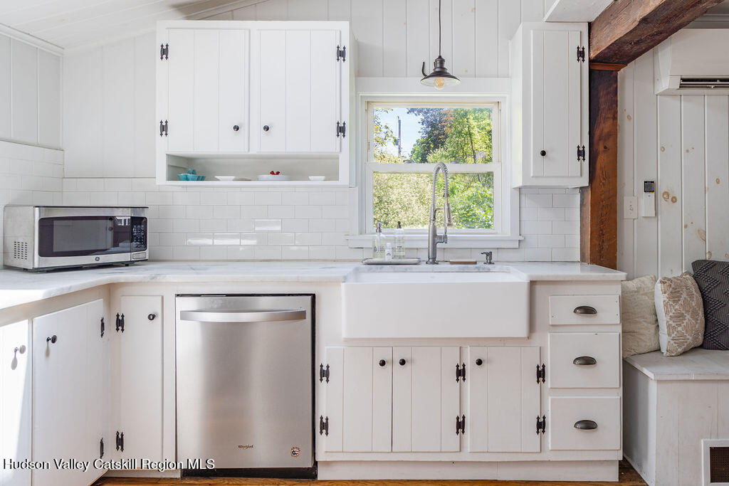 347 Hickory Bush Road Kingston, NY 12401 - Photo 10 of 44 a kitchen with granite countertop white cabinets and white appliances