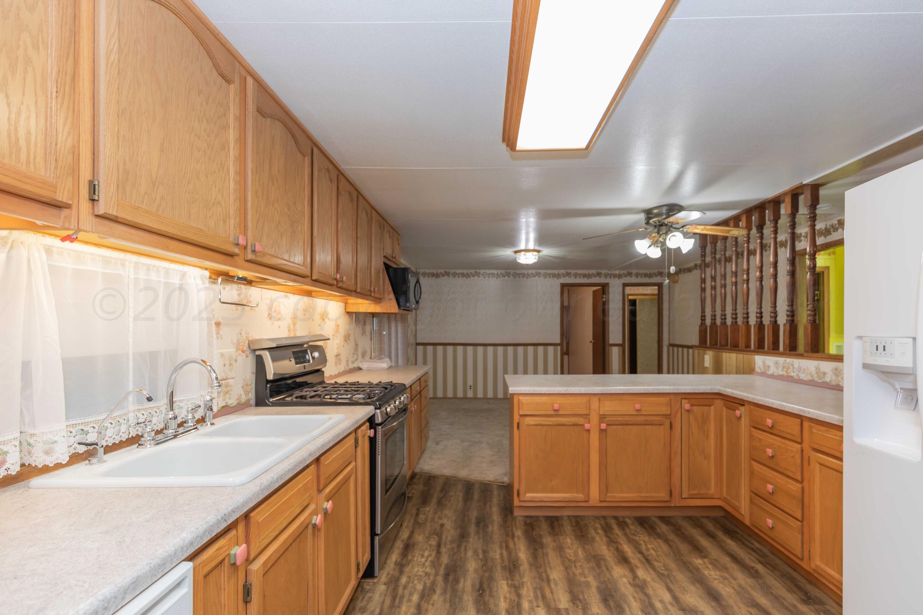 15700 Cavin Road Amarillo, TX 79119 - Photo 14 of 54 KITCHEN VIEW 3
