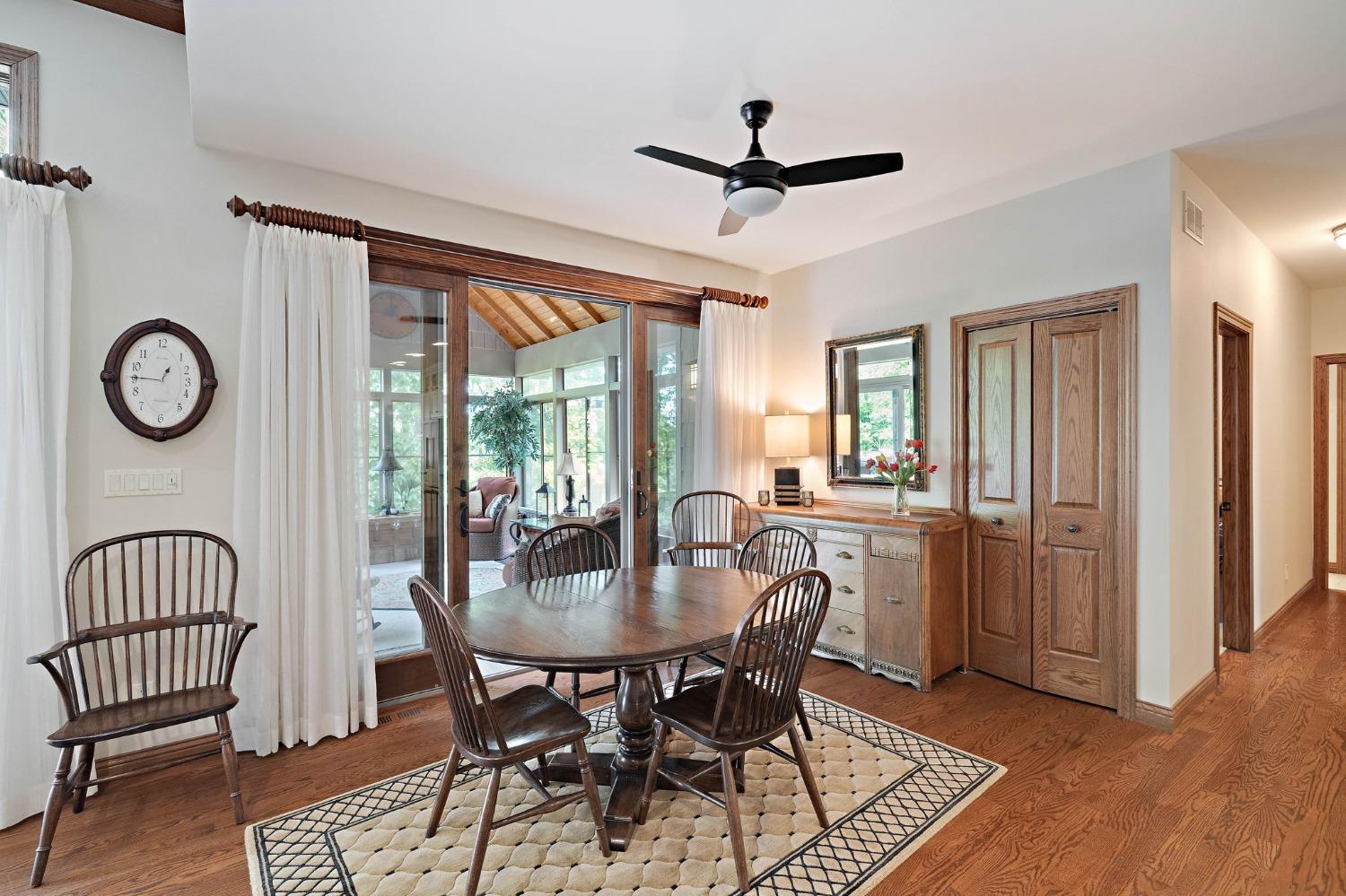 770 Quinlan Court Crown Point, IN 46307 - Photo 23 of 53 a view of a dining room with furniture window and wooden floor