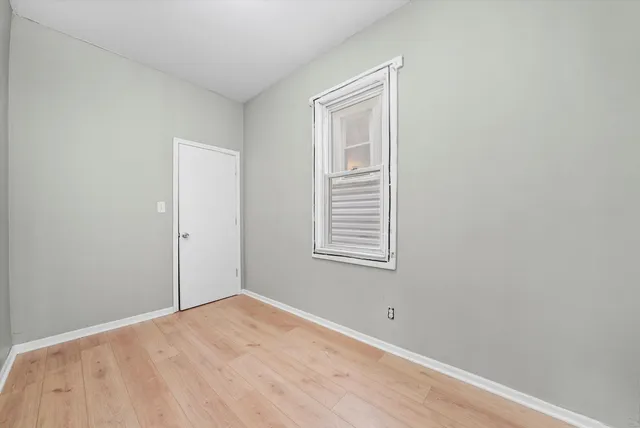 a view of empty room with windows