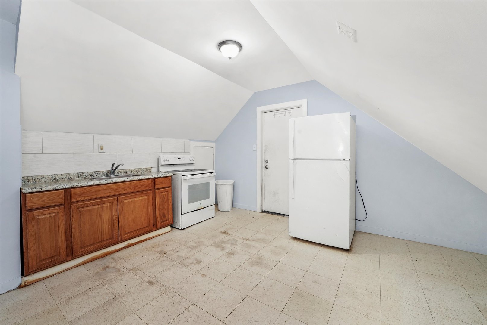 5014 South Paulina Street Chicago, IL 60609 - Photo 27 of 38 a view of a storage & utility room with a sink