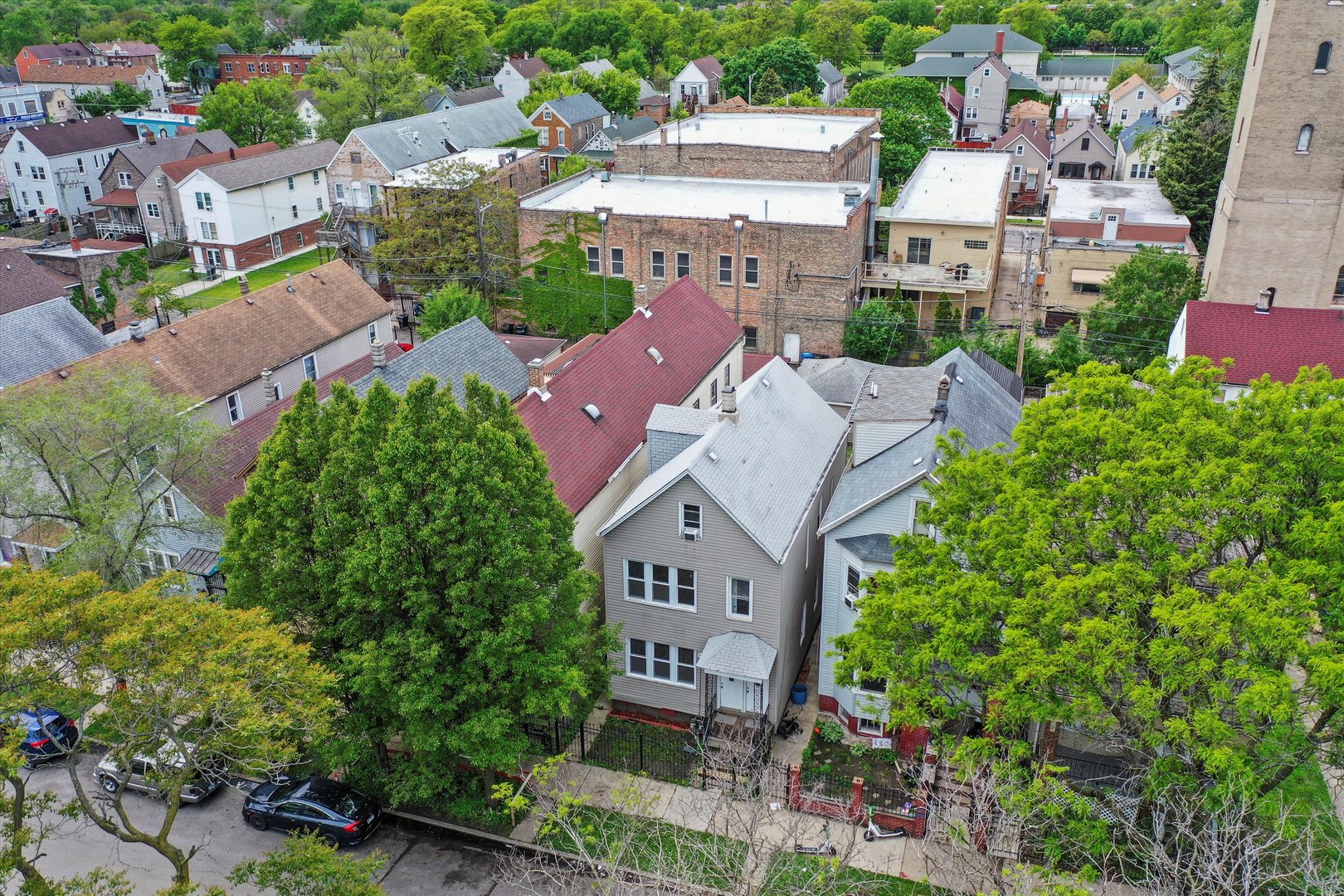 5014 South Paulina Street Chicago, IL 60609 - Photo 5 of 38 an aerial view of multiple houses with a yard